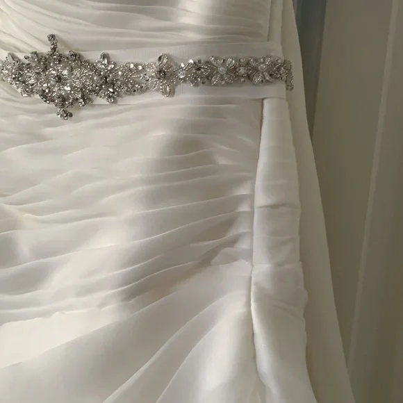 Beautiful off white Demtria cascading wedding dress.  Size 10, but altered. - Picture 5 of 12